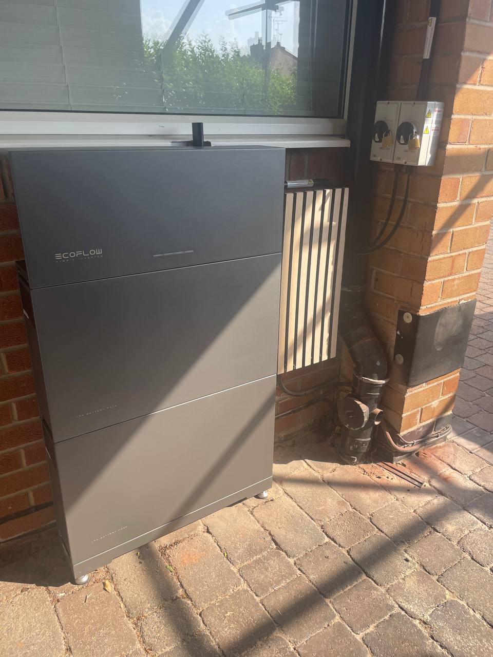 EcoFlow battery storage unit installed outside a home