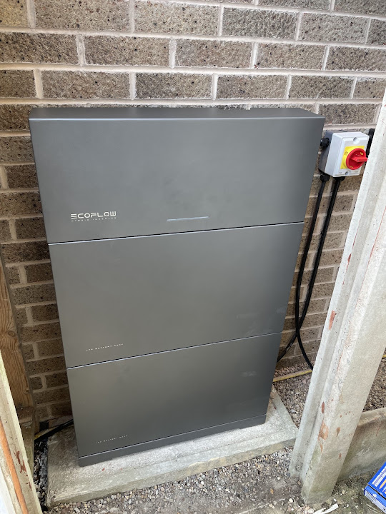 EcoFlow battery storage system mounted beside external isolation equipment