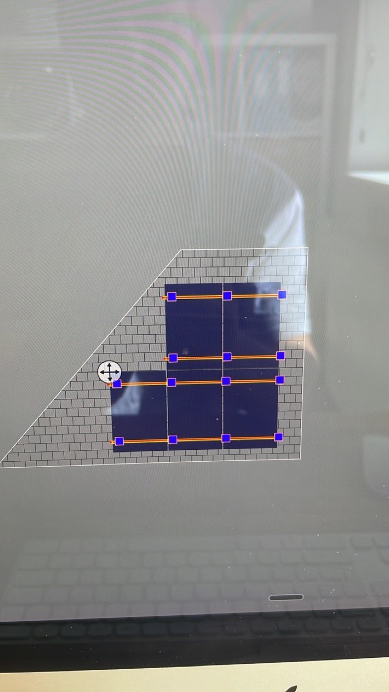 3D solar PV roof layout model showing panel positions on a tiled roof